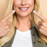 Cropped,Photo,Of,Pretty,Adorable,Woman,Wear,Khaki,Shirt,Pointing