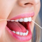 Teeths,Flossing.,Oral,Hygiene,And,Health,Care.,Smiling,Women,Use